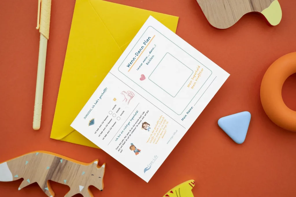 Wenn-Dann-Plan-Blatt auf orangem Hintergrund mit Holztieren