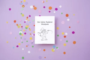 Titelblatt der Faltgeschichte „Der kleine Zauberer Wutziputz“ auf lila Hintergrund mit Konfetti